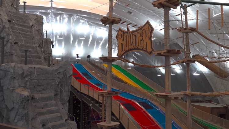Families enjoying activities at Bolder Adventure Park before its closure